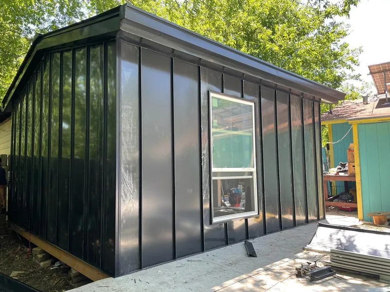 Black standing seam metal wall panels for Roof Inspection in Antrim